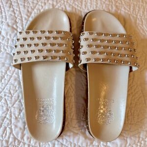 Vince Camuto studded slides.